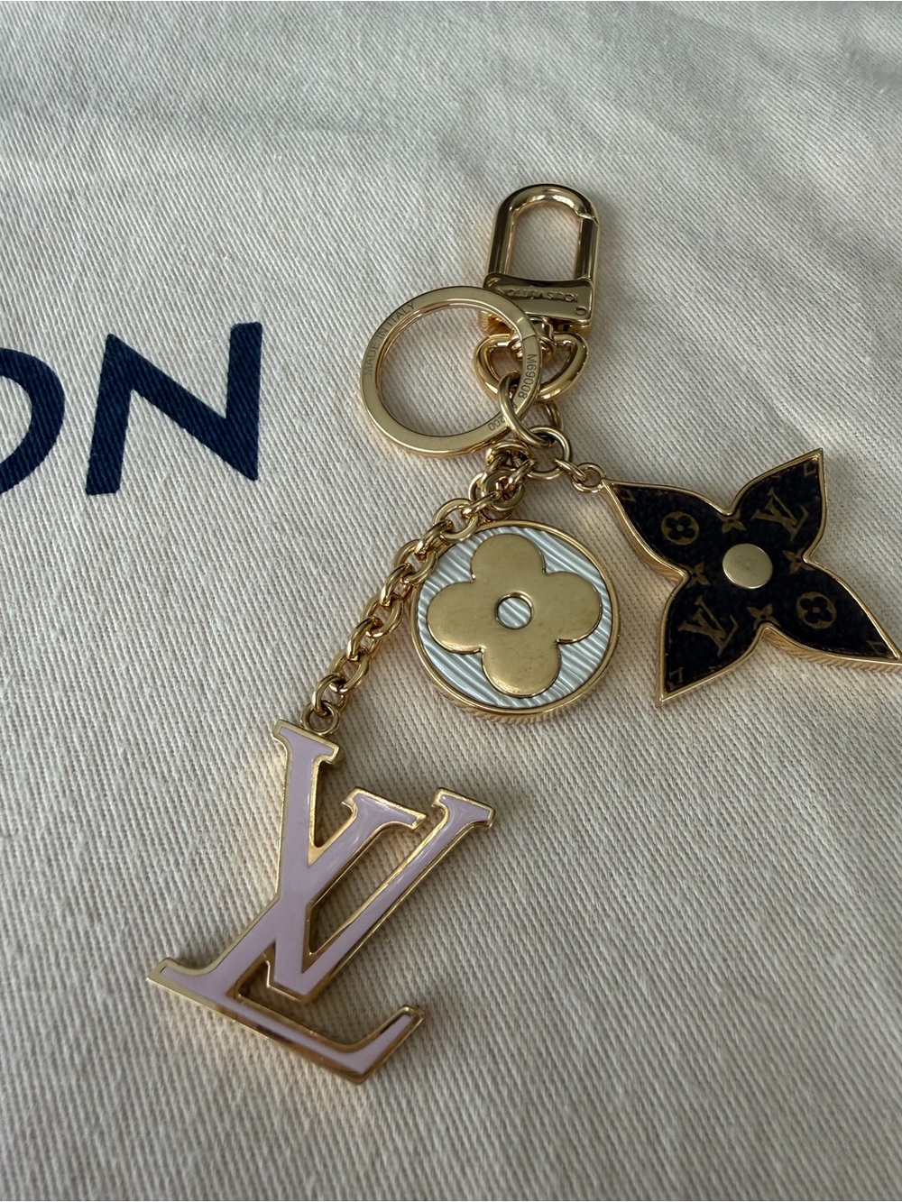 Louis Vuitton Monogram Fluer purse charm 
Authentic